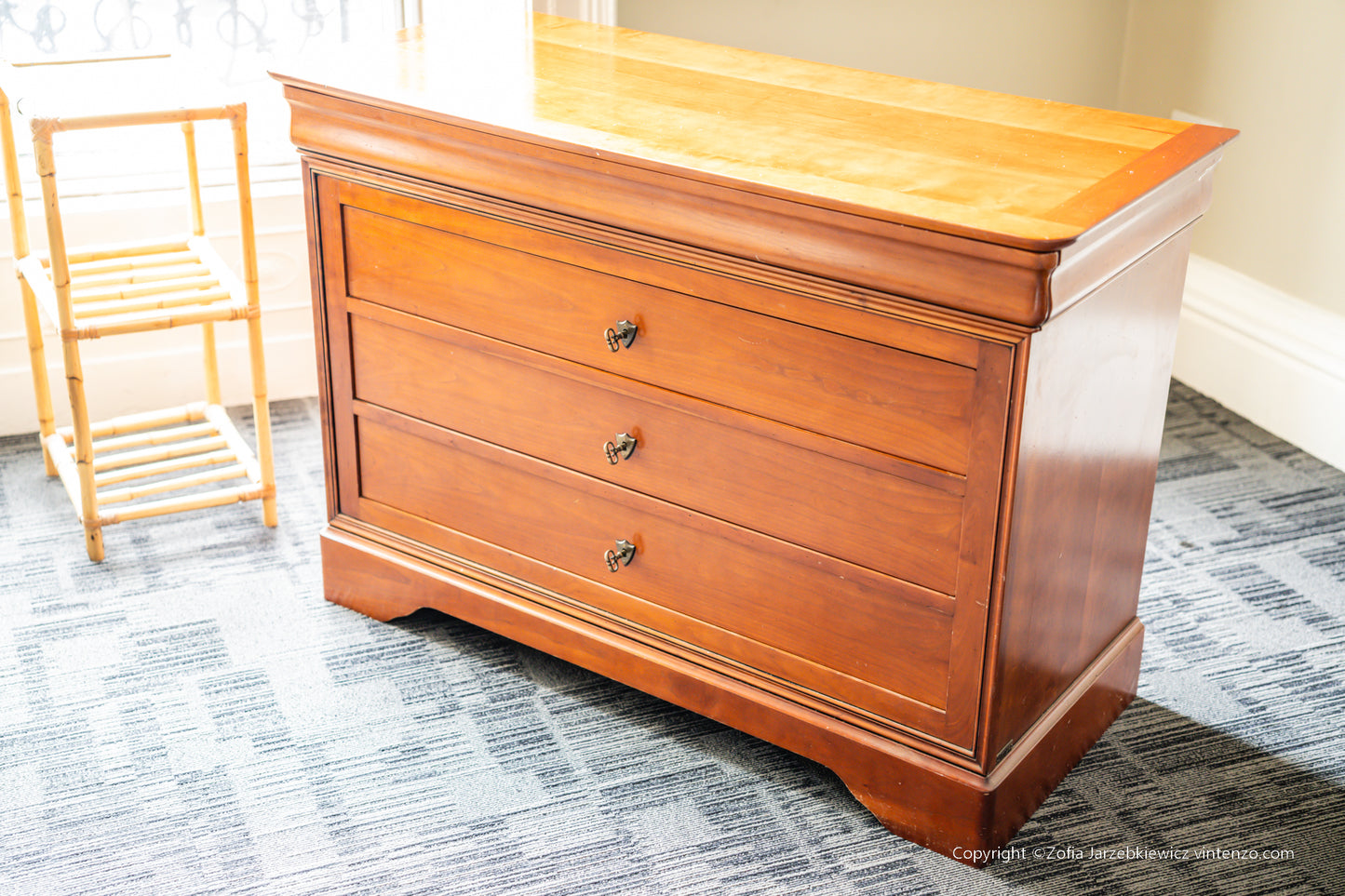 A French Cherrywood Four Drawer Chest of Drawers