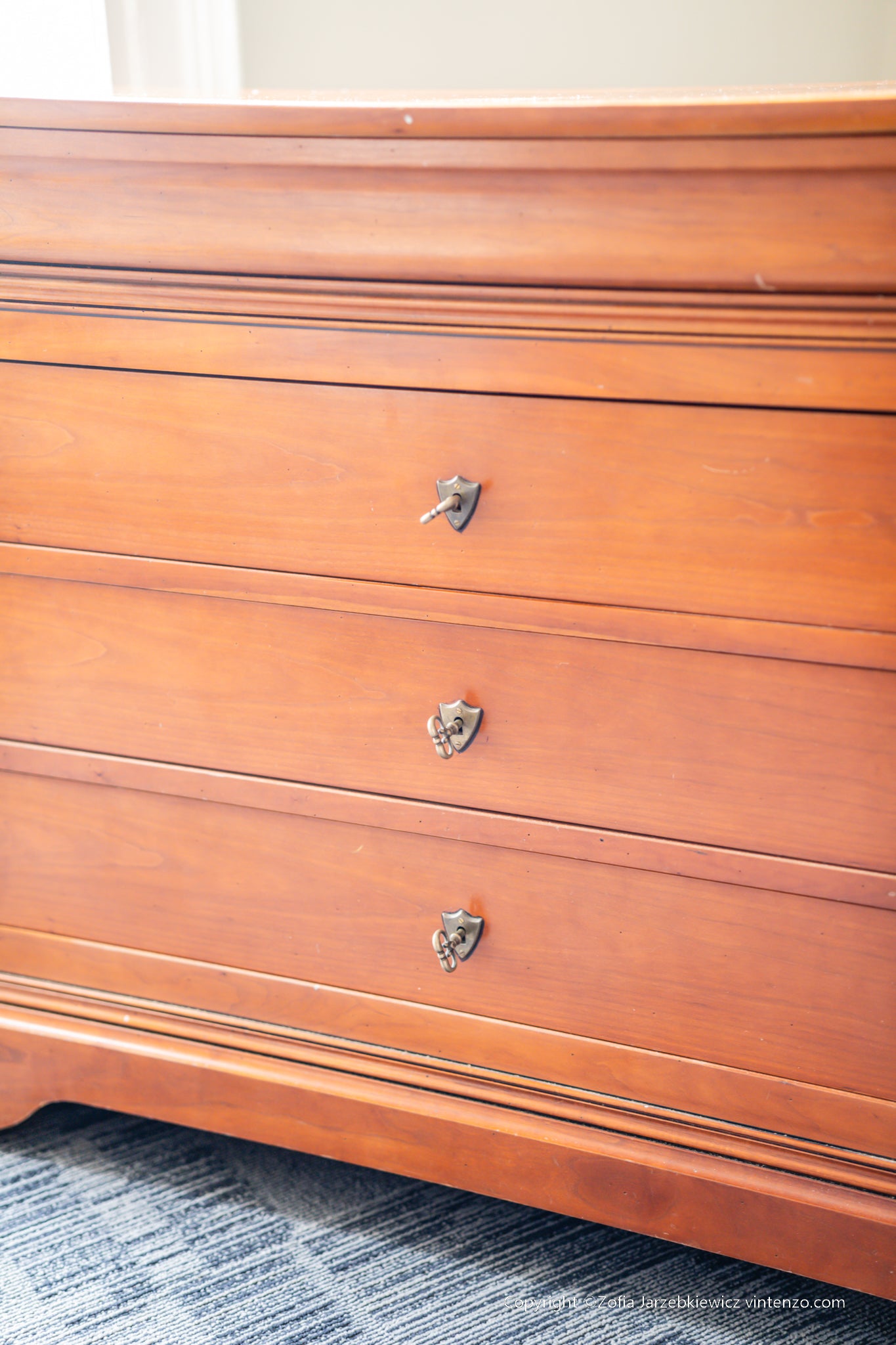 A French Cherrywood Four Drawer Chest of Drawers