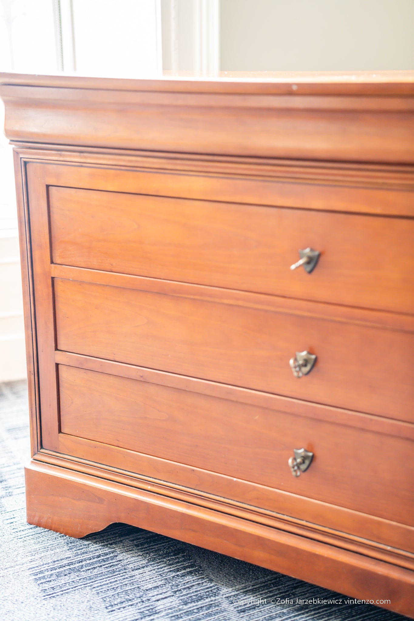A French Cherrywood Four Drawer Chest of Drawers