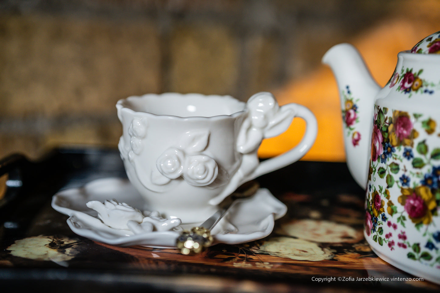 Cream Porcelain Cup and Saucer with 3D Roses and Cherub