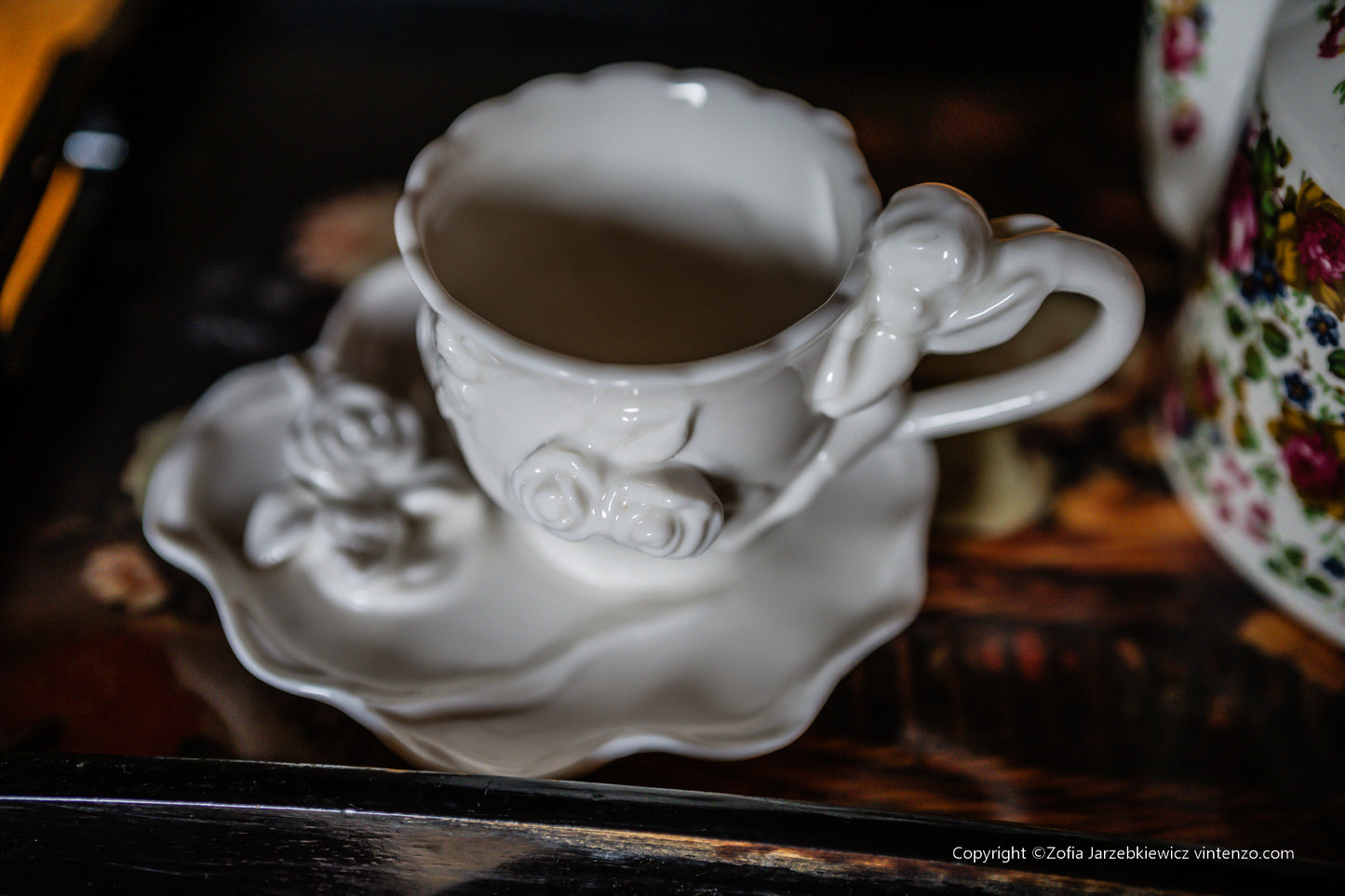 Cream Porcelain Cup and Saucer with 3D Roses and Cherub