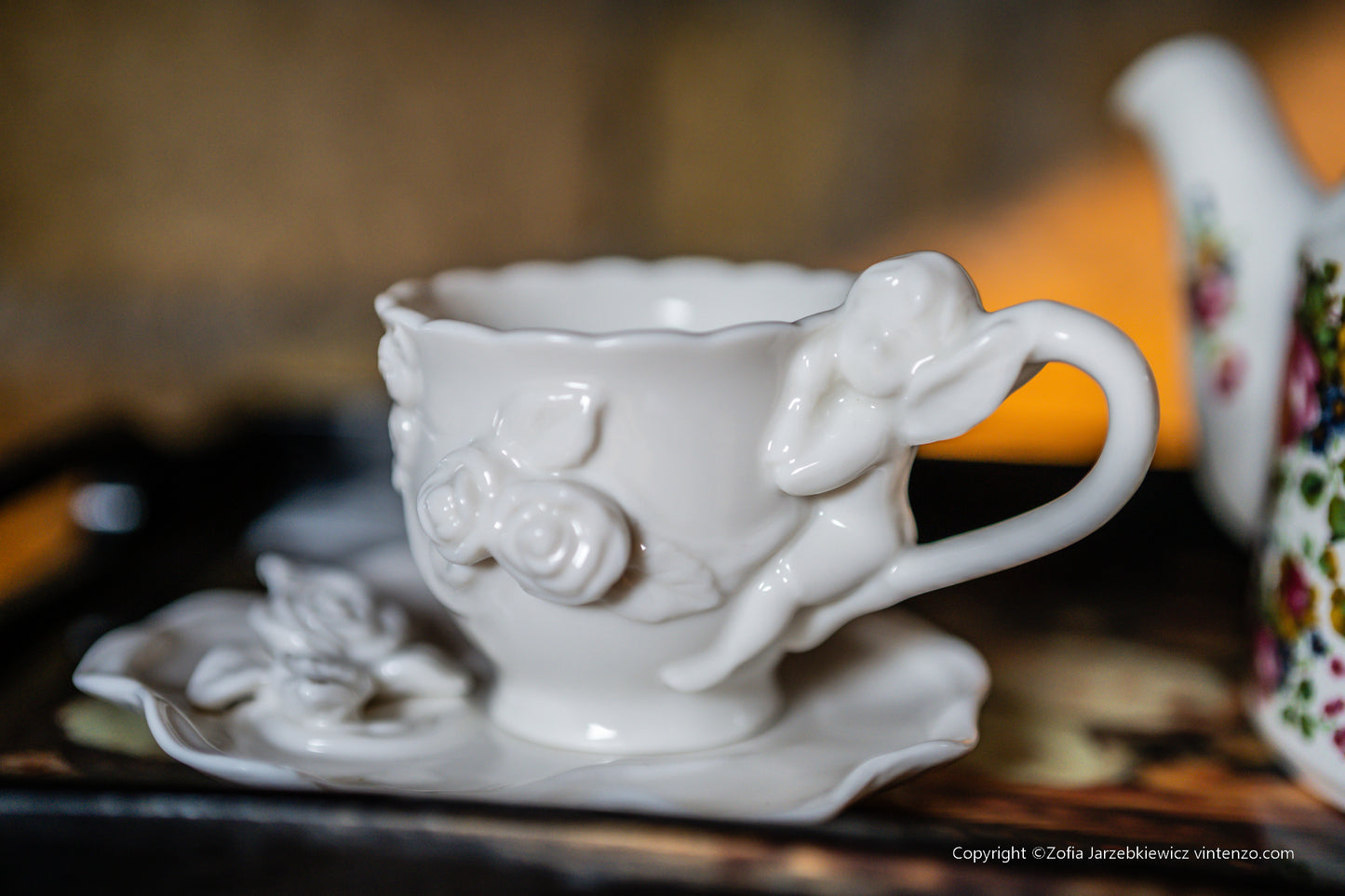Cream Porcelain Cup and Saucer with 3D Roses and Cherub