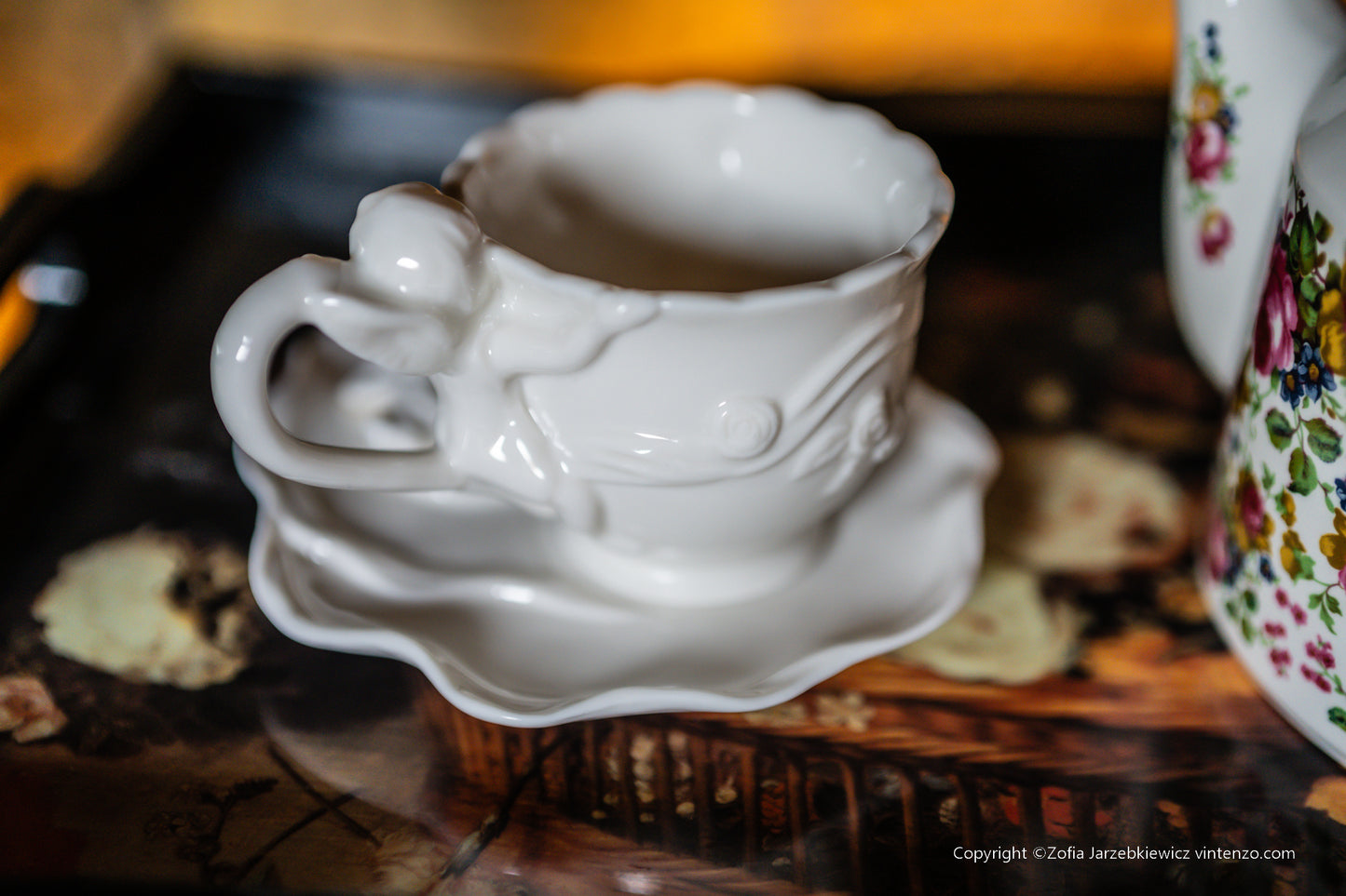 Cream Porcelain Cup and Saucer with 3D Roses and Cherub